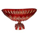 طرح‌های پیچیده ترمه روی کشکول قرمز.